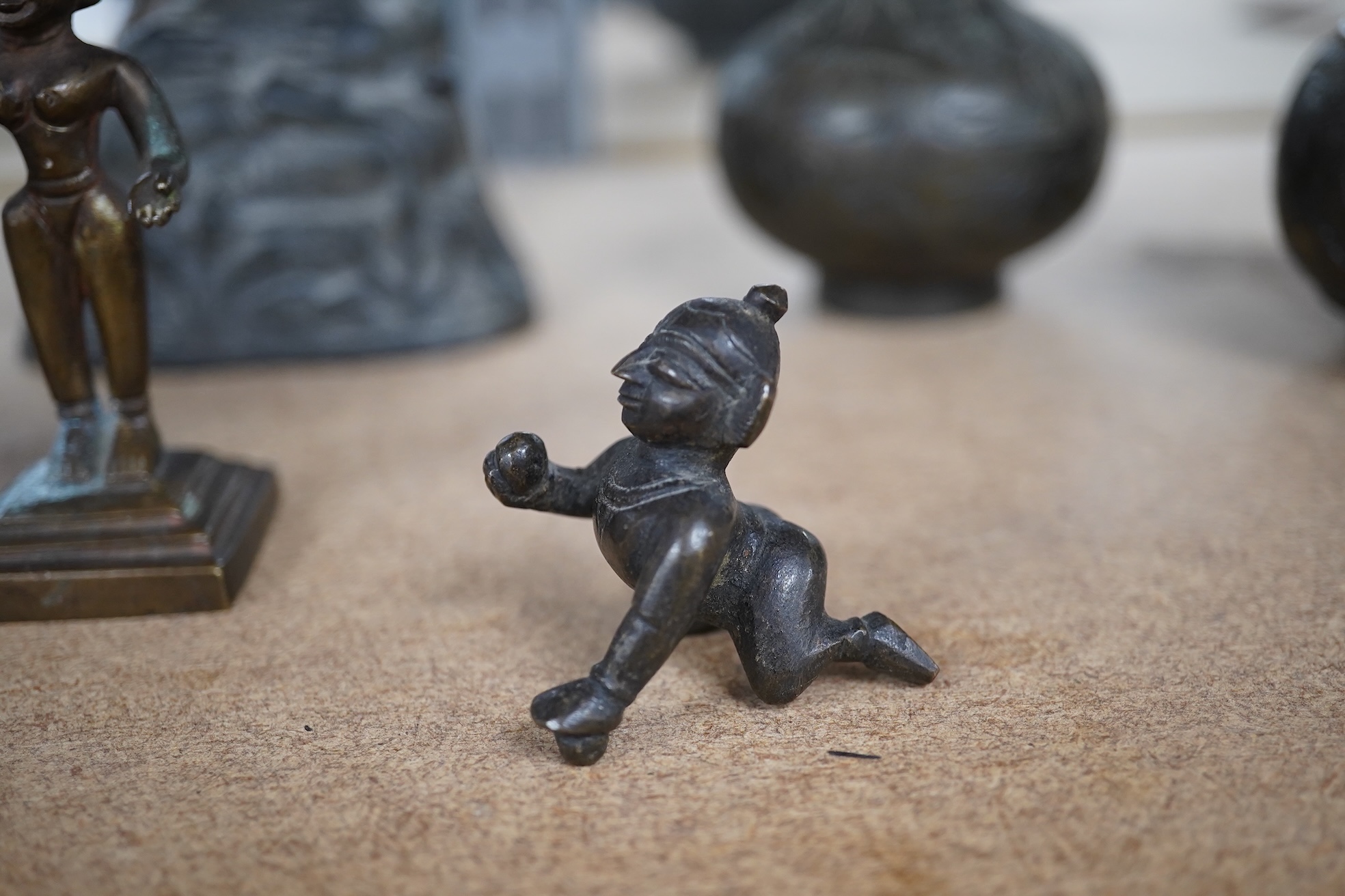 A group of Chinese and Indian bronze figures and vessels, 19th century and later, tallest 12cm. Condition - varies